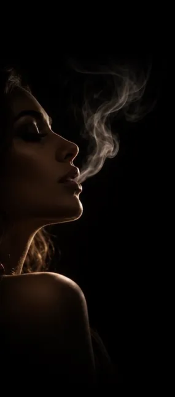 Woman exhaling smoke